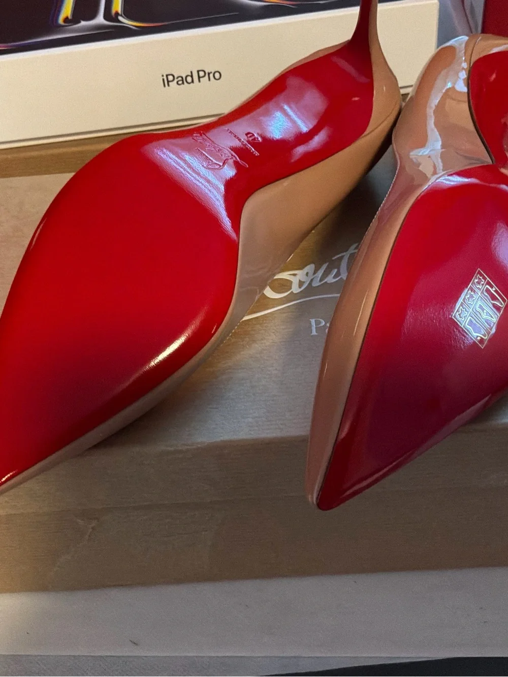 Christian Louboutin Nude Patent Pointed-Toe Pumps with Red Sole